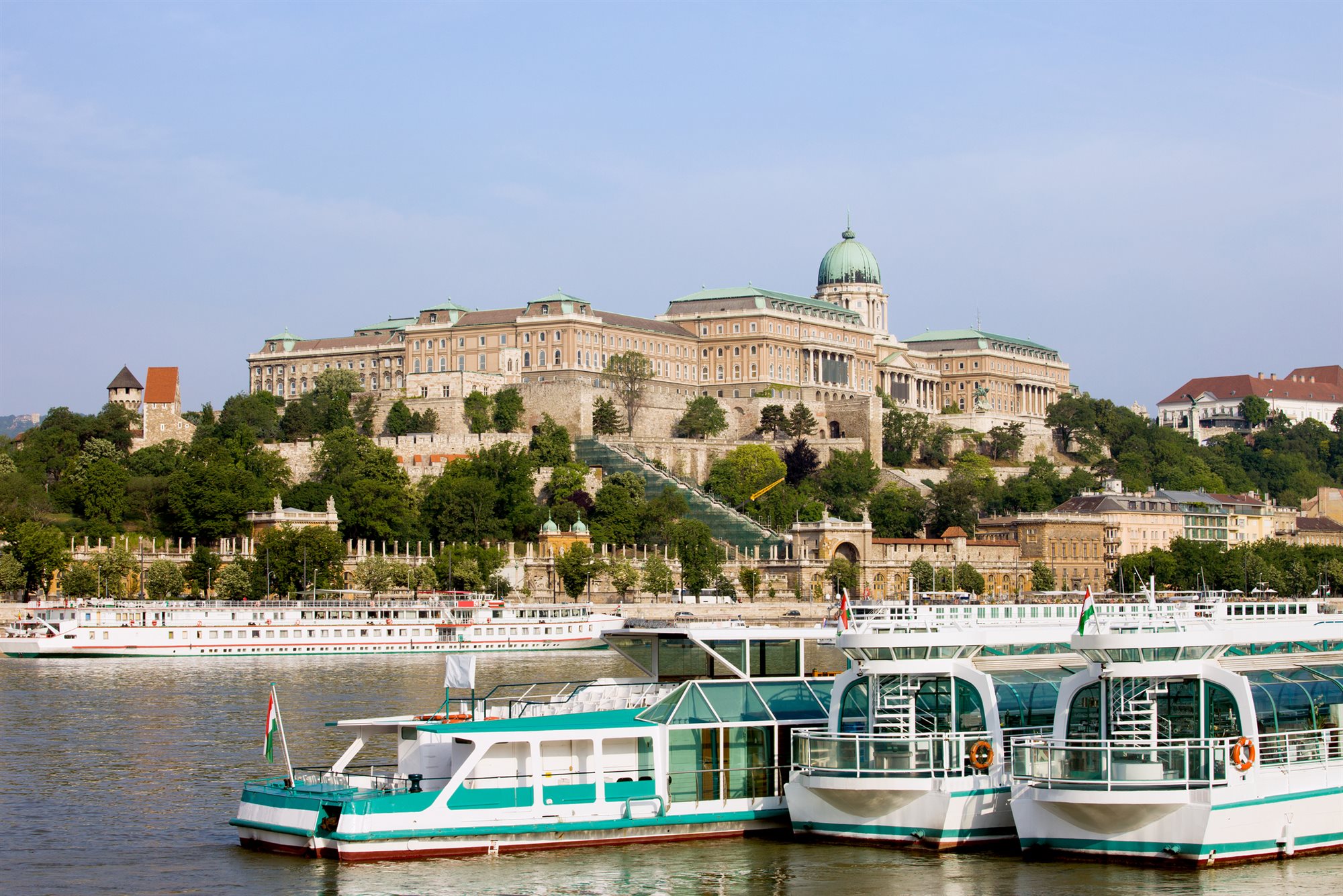 Riverfront old town with cathedral spires seen from a Danube river cruise deck